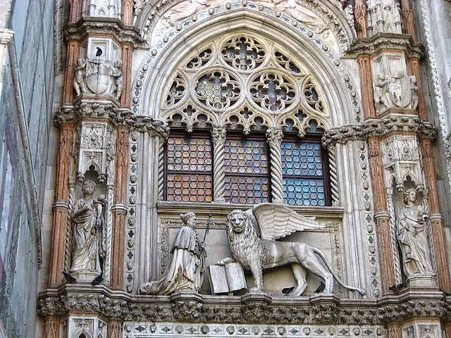 The Porta della Carta, the ornate Gothic gateway of the Doge's Palace, with the winged lion of St Mark above the entrance