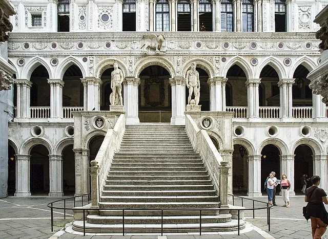 The Giants' Staircase of the Doge's Palace, flanked by Sansovino's statues of Mars and Neptune